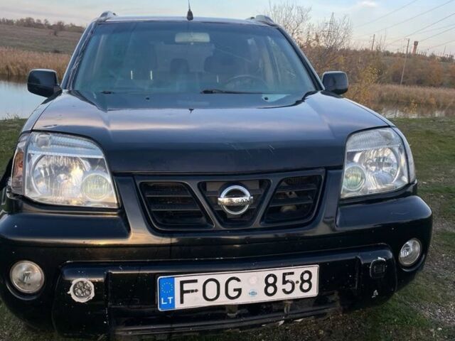 Черный Ниссан ИксТрейл, объемом двигателя 2.2 л и пробегом 400 тыс. км за 3222 $, фото 1 на Automoto.ua