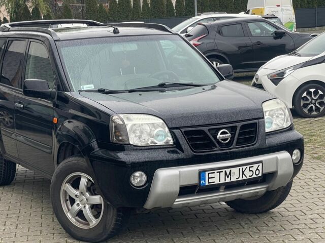 Черный Ниссан ИксТрейл, объемом двигателя 2.2 л и пробегом 290 тыс. км за 3841 $, фото 1 на Automoto.ua