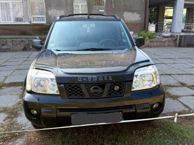 Чорний Ніссан ІксТрейл, об'ємом двигуна 2.2 л та пробігом 360 тис. км за 4500 $, фото 1 на Automoto.ua