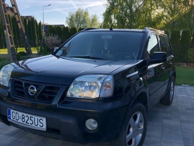 Черный Ниссан ИксТрейл, объемом двигателя 2.2 л и пробегом 266 тыс. км за 2200 $, фото 1 на Automoto.ua