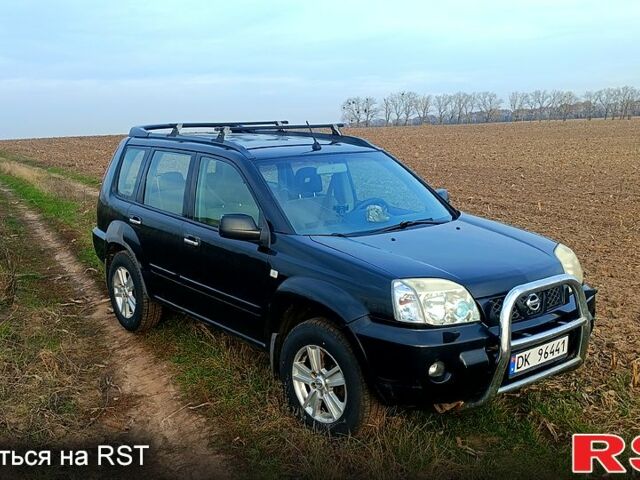 Черный Ниссан ИксТрейл, объемом двигателя 2.2 л и пробегом 294 тыс. км за 5000 $, фото 1 на Automoto.ua