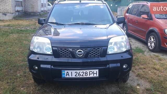 Черный Ниссан ИксТрейл, объемом двигателя 2 л и пробегом 430 тыс. км за 5300 $, фото 1 на Automoto.ua