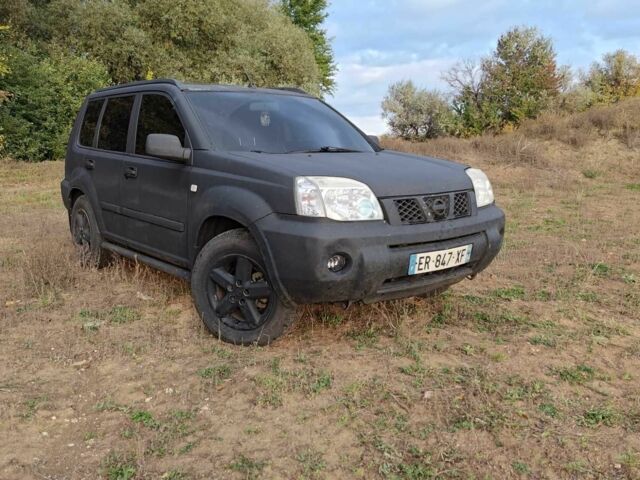 Черный Ниссан ИксТрейл, объемом двигателя 2.2 л и пробегом 290 тыс. км за 4200 $, фото 1 на Automoto.ua