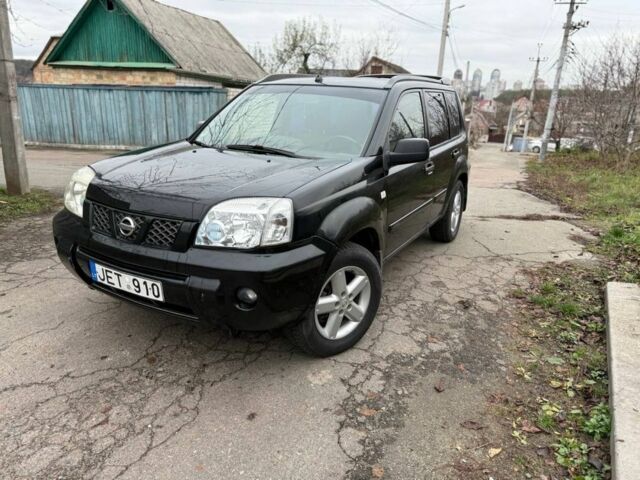 Черный Ниссан ИксТрейл, объемом двигателя 2.2 л и пробегом 290 тыс. км за 3750 $, фото 1 на Automoto.ua