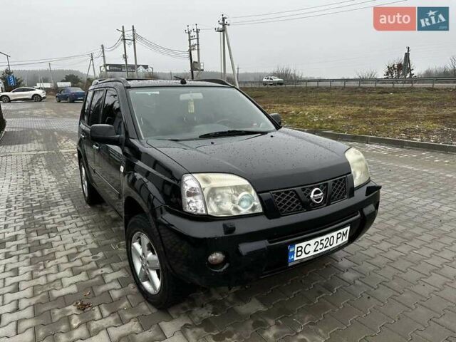 Черный Ниссан ИксТрейл, объемом двигателя 2.5 л и пробегом 282 тыс. км за 6250 $, фото 1 на Automoto.ua