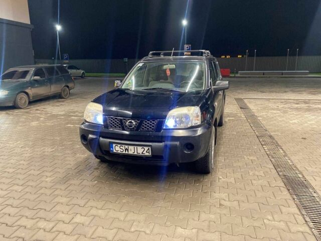 Черный Ниссан ИксТрейл, объемом двигателя 2 л и пробегом 270 тыс. км за 3700 $, фото 1 на Automoto.ua