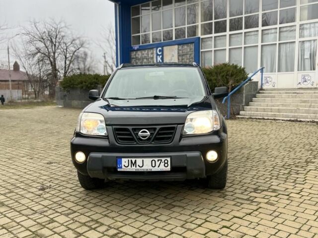 Чорний Ніссан ІксТрейл, об'ємом двигуна 2.2 л та пробігом 200 тис. км за 2600 $, фото 1 на Automoto.ua