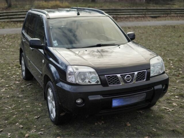 Черный Ниссан ИксТрейл, объемом двигателя 2.2 л и пробегом 273 тыс. км за 4267 $, фото 1 на Automoto.ua