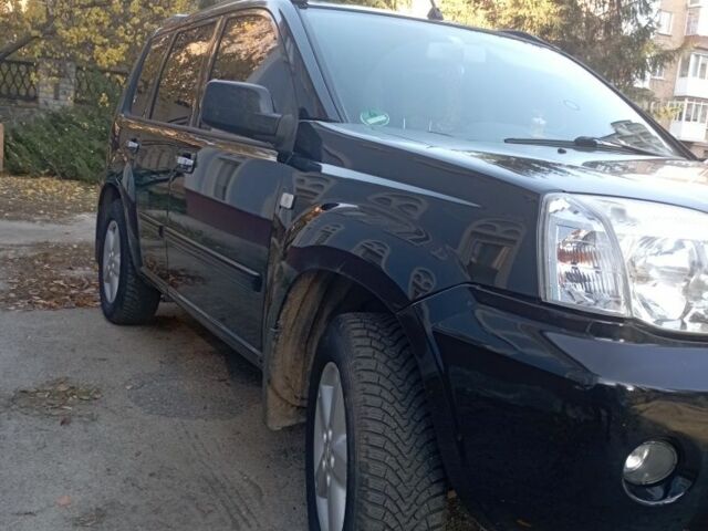 Черный Ниссан ИксТрейл, объемом двигателя 2 л и пробегом 196 тыс. км за 4300 $, фото 1 на Automoto.ua