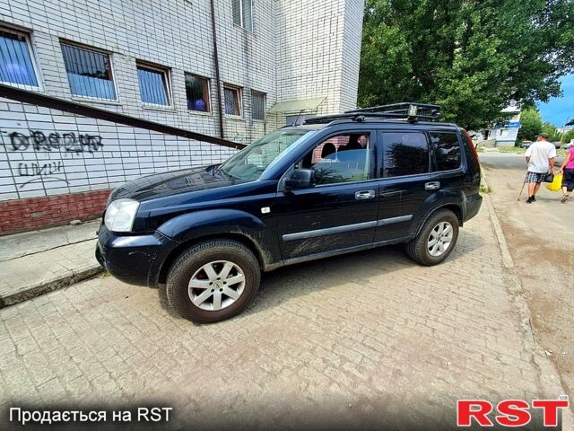 Черный Ниссан ИксТрейл, объемом двигателя 2.2 л и пробегом 340 тыс. км за 5000 $, фото 1 на Automoto.ua