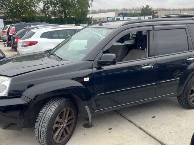 Черный Ниссан ИксТрейл, объемом двигателя 2.2 л и пробегом 260 тыс. км за 4254 $, фото 1 на Automoto.ua