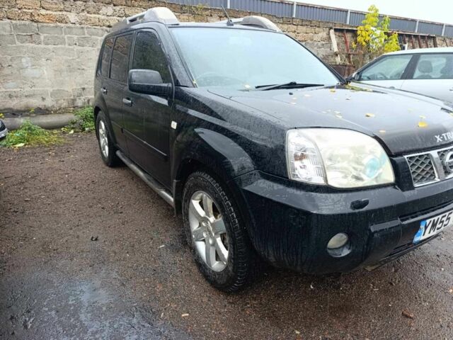 Черный Ниссан ИксТрейл, объемом двигателя 2 л и пробегом 180 тыс. км за 4500 $, фото 1 на Automoto.ua