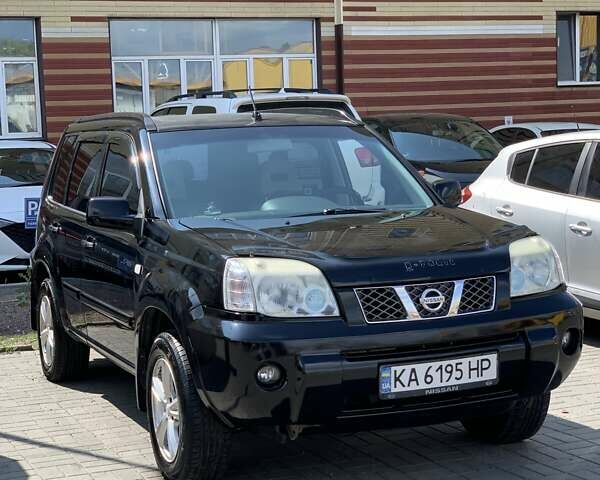 Черный Ниссан ИксТрейл, объемом двигателя 2.2 л и пробегом 227 тыс. км за 8300 $, фото 1 на Automoto.ua