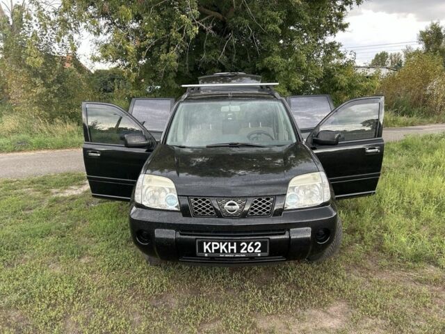 Черный Ниссан ИксТрейл, объемом двигателя 2.2 л и пробегом 252 тыс. км за 3600 $, фото 1 на Automoto.ua