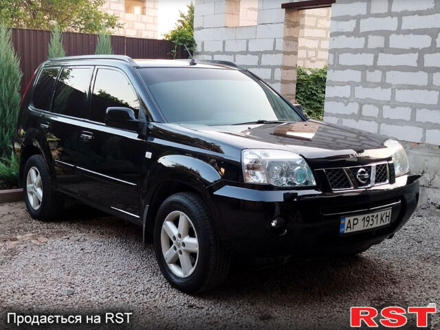 Черный Ниссан ИксТрейл, объемом двигателя 2 л и пробегом 200 тыс. км за 6200 $, фото 1 на Automoto.ua