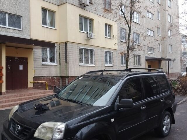 Черный Ниссан ИксТрейл, объемом двигателя 2.2 л и пробегом 260 тыс. км за 4500 $, фото 1 на Automoto.ua