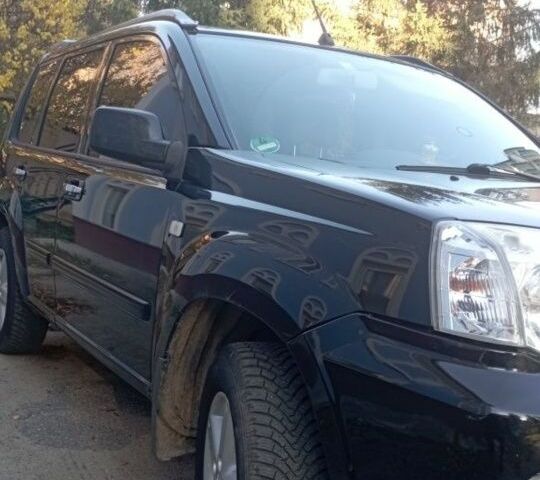 Черный Ниссан ИксТрейл, объемом двигателя 0 л и пробегом 196 тыс. км за 4100 $, фото 1 на Automoto.ua