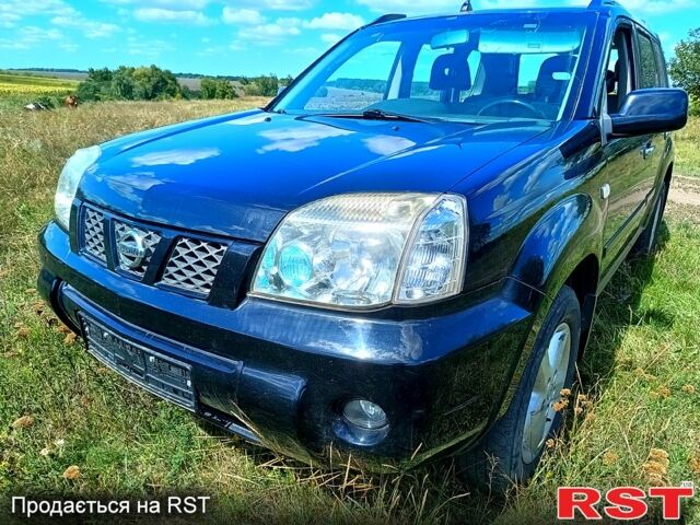 Черный Ниссан ИксТрейл, объемом двигателя 2.2 л и пробегом 255 тыс. км за 3600 $, фото 1 на Automoto.ua