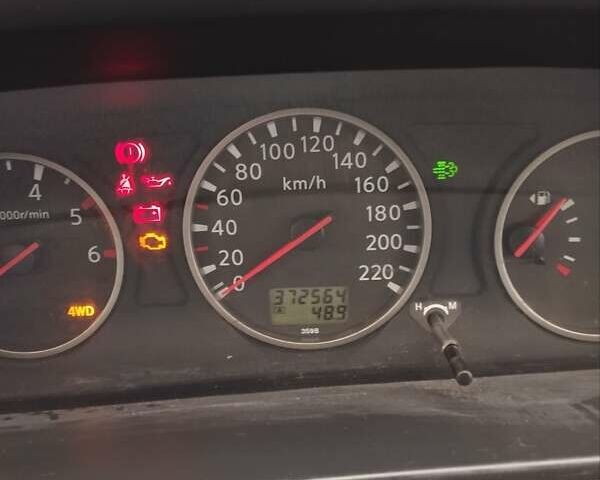 Черный Ниссан ИксТрейл, объемом двигателя 2.2 л и пробегом 373 тыс. км за 5800 $, фото 1 на Automoto.ua