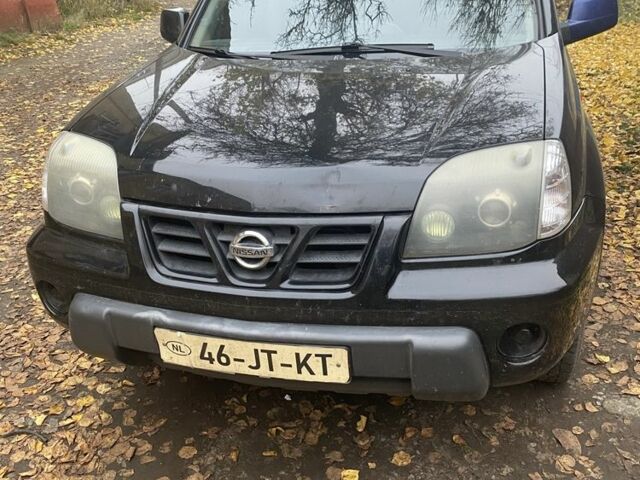 Черный Ниссан ИксТрейл, объемом двигателя 2.2 л и пробегом 397 тыс. км за 3700 $, фото 1 на Automoto.ua