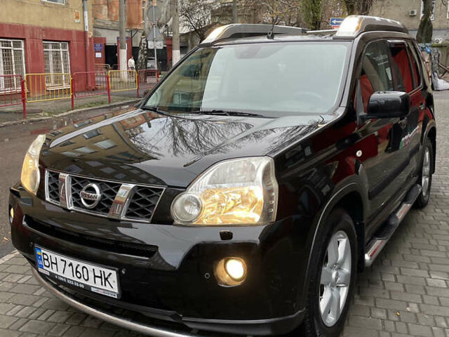 Черный Ниссан ИксТрейл, объемом двигателя 2 л и пробегом 193 тыс. км за 8700 $, фото 1 на Automoto.ua