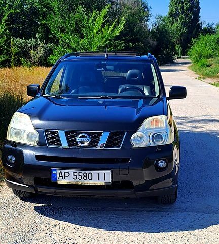 Черный Ниссан ИксТрейл, объемом двигателя 2.5 л и пробегом 223 тыс. км за 7500 $, фото 1 на Automoto.ua