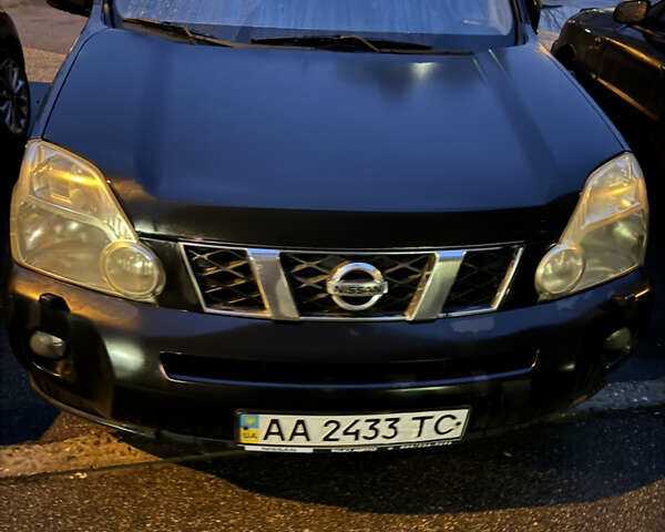 Черный Ниссан ИксТрейл, объемом двигателя 2 л и пробегом 210 тыс. км за 8500 $, фото 1 на Automoto.ua