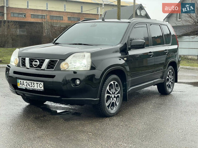 Черный Ниссан ИксТрейл, объемом двигателя 2 л и пробегом 210 тыс. км за 8750 $, фото 1 на Automoto.ua