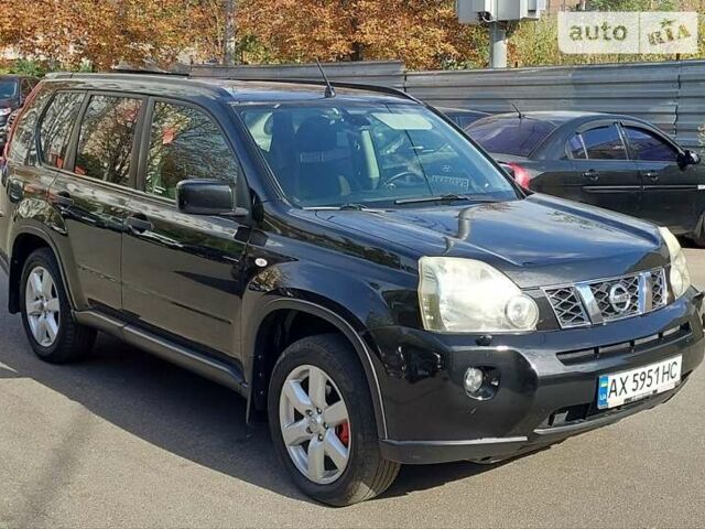 Черный Ниссан ИксТрейл, объемом двигателя 2 л и пробегом 240 тыс. км за 9800 $, фото 1 на Automoto.ua