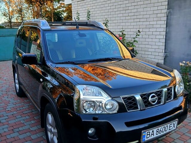 Чорний Ніссан ІксТрейл, об'ємом двигуна 2 л та пробігом 330 тис. км за 9300 $, фото 1 на Automoto.ua