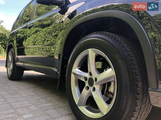Черный Ниссан ИксТрейл, объемом двигателя 2 л и пробегом 140 тыс. км за 11600 $, фото 1 на Automoto.ua