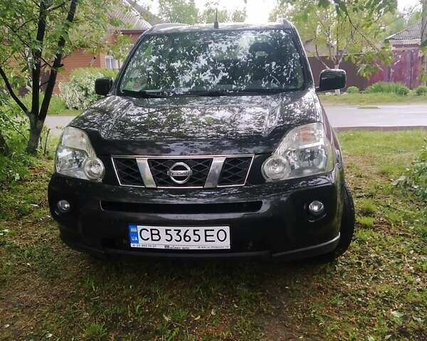 Черный Ниссан ИксТрейл, объемом двигателя 2 л и пробегом 305 тыс. км за 9800 $, фото 1 на Automoto.ua