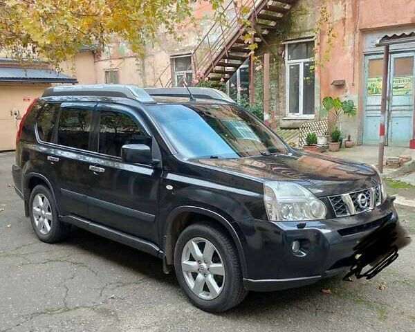 Черный Ниссан ИксТрейл, объемом двигателя 25 л и пробегом 213 тыс. км за 9725 $, фото 1 на Automoto.ua