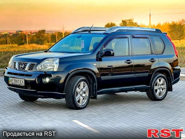 Черный Ниссан ИксТрейл, объемом двигателя 2 л и пробегом 227 тыс. км за 8300 $, фото 1 на Automoto.ua