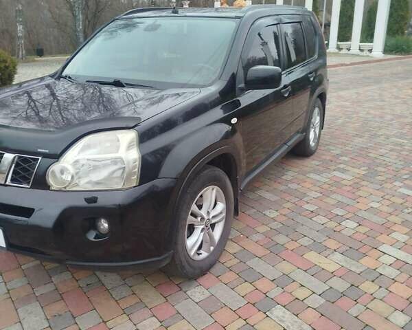 Черный Ниссан ИксТрейл, объемом двигателя 2 л и пробегом 262 тыс. км за 8950 $, фото 1 на Automoto.ua