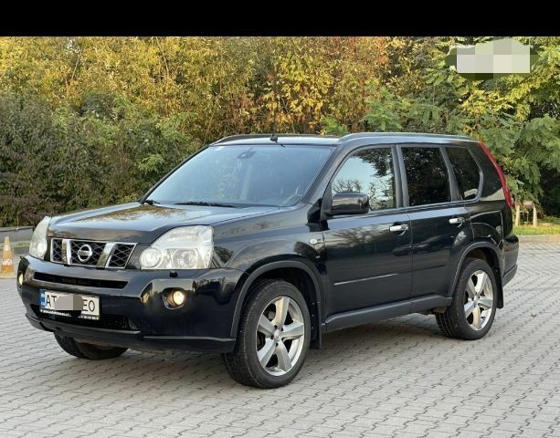 Черный Ниссан ИксТрейл, объемом двигателя 2 л и пробегом 244 тыс. км за 8298 $, фото 1 на Automoto.ua
