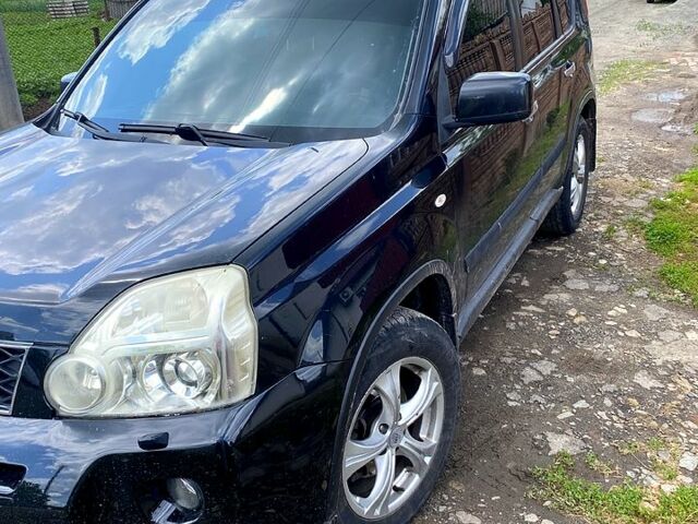 Черный Ниссан ИксТрейл, объемом двигателя 2.5 л и пробегом 280 тыс. км за 7500 $, фото 1 на Automoto.ua