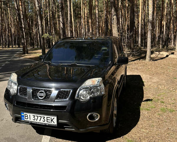 Черный Ниссан ИксТрейл, объемом двигателя 2 л и пробегом 226 тыс. км за 13000 $, фото 1 на Automoto.ua