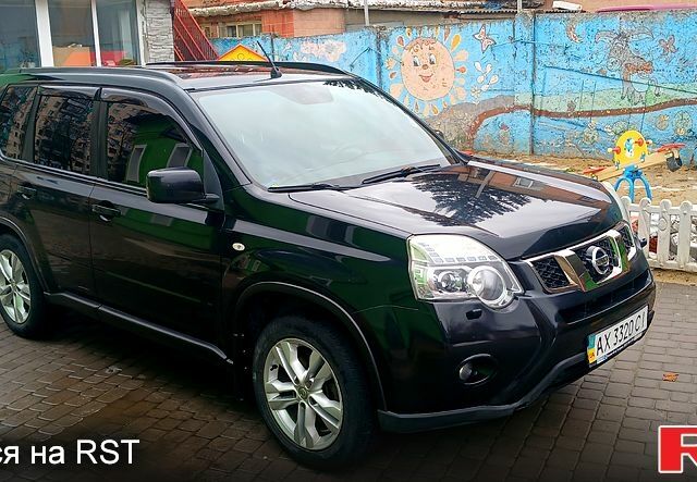 Черный Ниссан ИксТрейл, объемом двигателя 2.5 л и пробегом 215 тыс. км за 7500 $, фото 1 на Automoto.ua