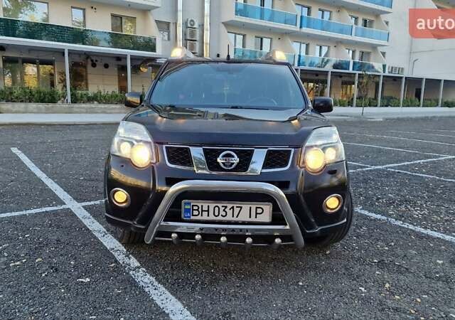 Чорний Ніссан ІксТрейл, об'ємом двигуна 2 л та пробігом 179 тис. км за 12500 $, фото 1 на Automoto.ua