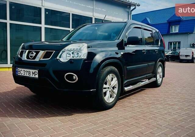 Черный Ниссан ИксТрейл, объемом двигателя 2 л и пробегом 169 тыс. км за 10500 $, фото 1 на Automoto.ua