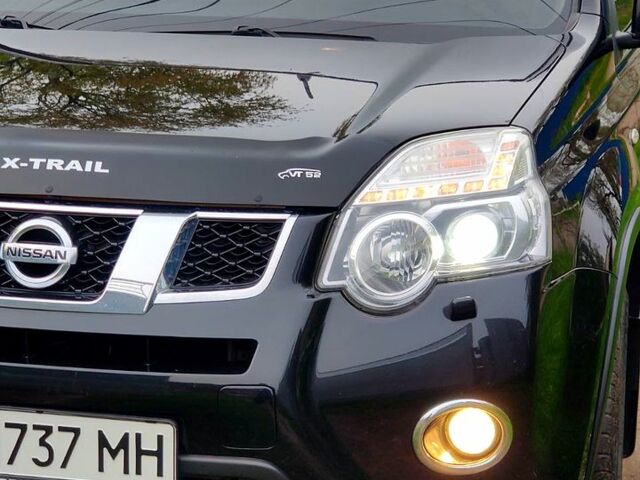 Черный Ниссан ИксТрейл, объемом двигателя 2 л и пробегом 210 тыс. км за 13240 $, фото 1 на Automoto.ua