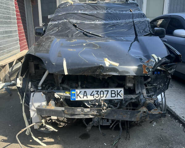 Черный Ниссан ИксТрейл, объемом двигателя 2 л и пробегом 170 тыс. км за 3900 $, фото 1 на Automoto.ua