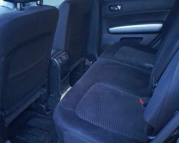 Черный Ниссан ИксТрейл, объемом двигателя 2 л и пробегом 230 тыс. км за 10400 $, фото 1 на Automoto.ua