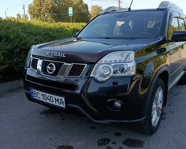 Черный Ниссан ИксТрейл, объемом двигателя 2 л и пробегом 132 тыс. км за 12800 $, фото 1 на Automoto.ua