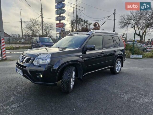 Черный Ниссан ИксТрейл, объемом двигателя 2 л и пробегом 114 тыс. км за 14000 $, фото 1 на Automoto.ua