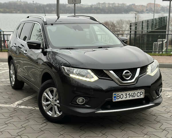 Черный Ниссан ИксТрейл, объемом двигателя 1.6 л и пробегом 200 тыс. км за 16300 $, фото 1 на Automoto.ua