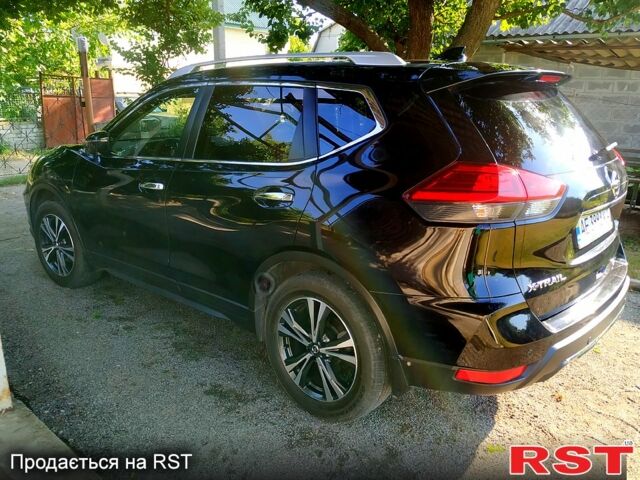 Черный Ниссан ИксТрейл, объемом двигателя 1.6 л и пробегом 100 тыс. км за 23500 $, фото 1 на Automoto.ua