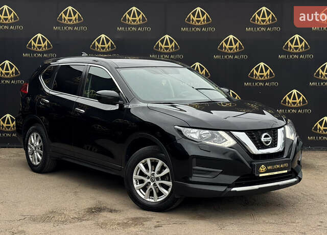Черный Ниссан ИксТрейл, объемом двигателя 2 л и пробегом 129 тыс. км за 18300 $, фото 1 на Automoto.ua
