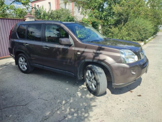 Коричневый Ниссан ИксТрейл, объемом двигателя 2 л и пробегом 238 тыс. км за 9300 $, фото 1 на Automoto.ua